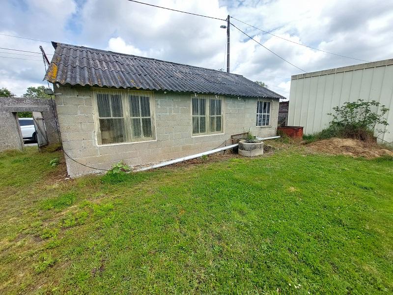 Lot de 2 garages et terrain constructible