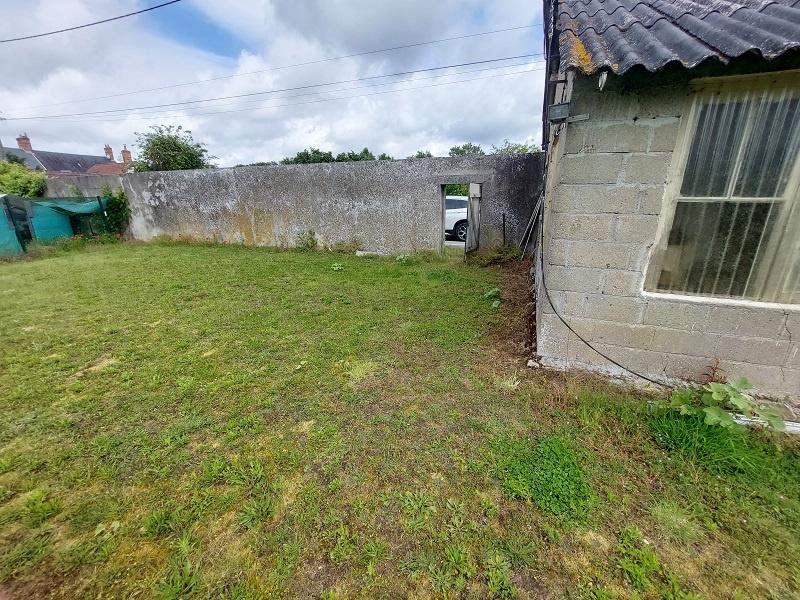 Lot de 2 garages et terrain constructible